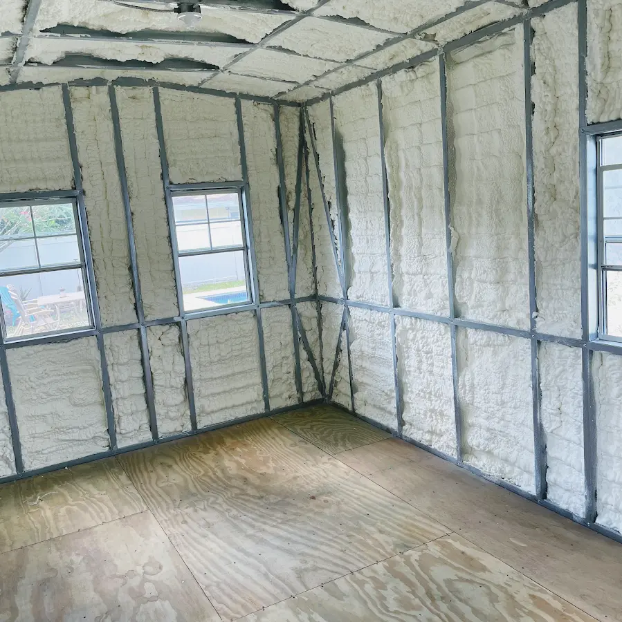 Closed-cell spray foam insulation applied to wall cavities in a residential project in Jeffersonville